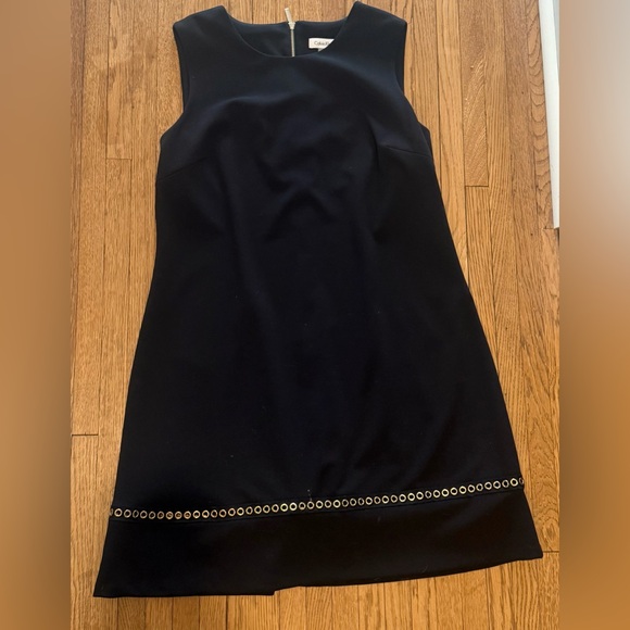 Calvin Klein Dresses & Skirts - Calvin Klein Black Mini Dress with Gold Accents